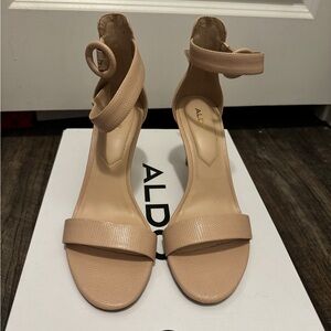 Pale pink strapped heels